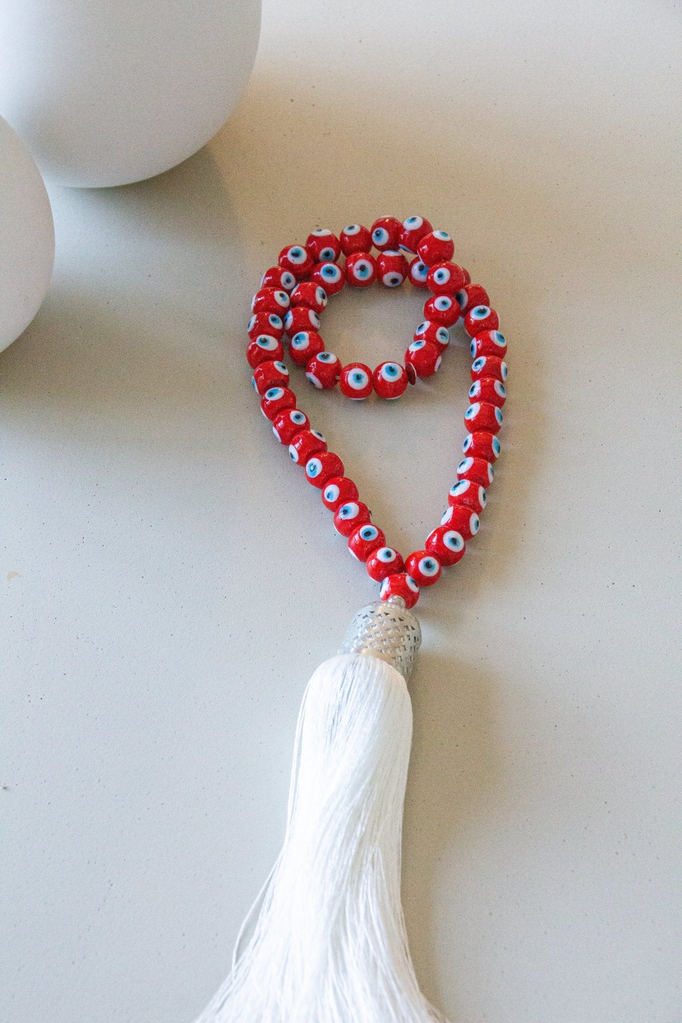 Evil eye glass beads home decor necklace with white silk tassel - Red - Stylish Luck Home Decor | Hamsa \ Hand Of Fatima | Good Luck Gifts