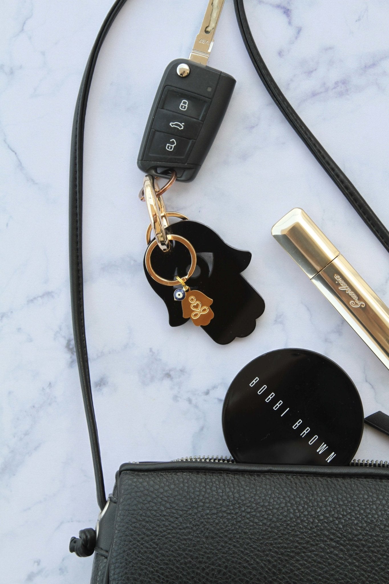 מחזיק מפתחות חמסה, חמסה מפרספקס, מחזיק מפתחות עם עין הרע, חמסה למזל, מתנה רוחנית, קמע חמסה, חמסה שחורה, אקססוריז למפתחות, מחזיק מפתחות יוקרתי, מתנה עם משמעות, חמסה מעוצבת, אביזרים עם סמלים רוחניים, מתנות לאישה, מתנות למזל טוב, מתנה ייחודית.
Hamsa keychain, black acrylic Hamsa, Evil Eye keychain, lucky charm keychain, spiritual gift, protective talisman, black Hamsa, stylish keychain, luxury key accessory, meaningful gift, modern Hamsa design, spiritual symbols, gifts for her, good luck charm, unique gift.