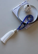Load image into Gallery viewer, Evil eye Royal blue glass beads home decor necklace with white silk tassel - Stylish Luck Home Decor | Hamsa \ Hand Of Fatima | Good Luck Gifts