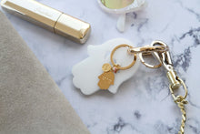Load image into Gallery viewer, White Acrylic Hamsa with Gold plated key holder &amp; Hamsa with evil eye with kabbalah name - stylish luck home decor